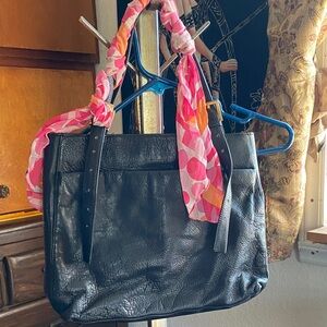 Stylish Black Leather Tote with Pink Accents